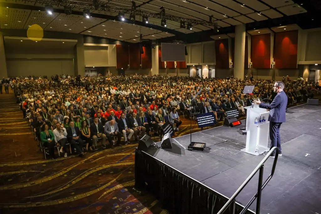 Corporate MC and Host, David Meade on stage at NECA 2025, Chicago, USA | David Meade Events