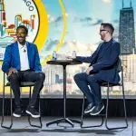 Corporate MC and Host, David Meade on stage at NECA 2025, Chicago, USA | David Meade Events