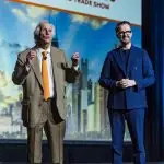 Corporate MC and Host, David Meade on stage at NECA 2025, Chicago, USA.| David Meade Events