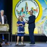 Corporate MC and Host, David Meade on stage at NECA 2025, Chicago, USA | David Meade Events