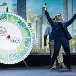 Corporate MC and Host, David Meade on stage at NECA 2025, Chicago, USA. | David Meade Events